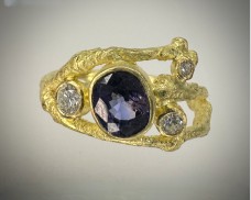 Bezel-Set Flat Oval Sapphire Ring with Diamonds